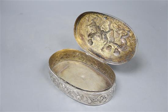 A late 19th century German Hanau embossed white metal oval box, J.D. Schleissner & Sohne, 16.2cm, 9oz.